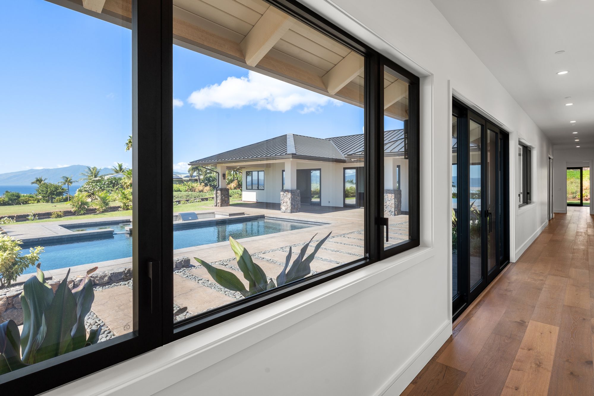 Hallway with windows to the pool